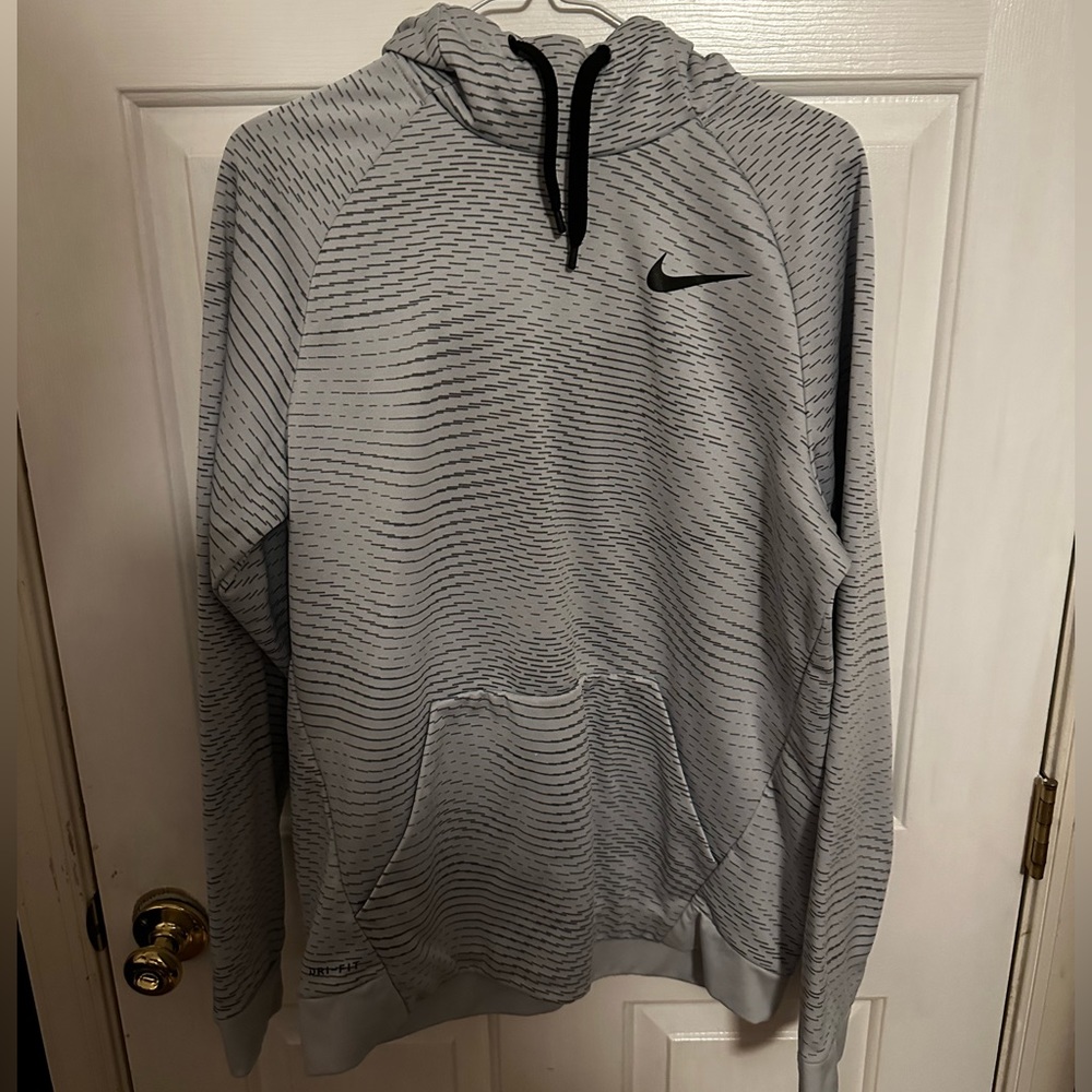 Grey Nike sweatshirt. Size M.